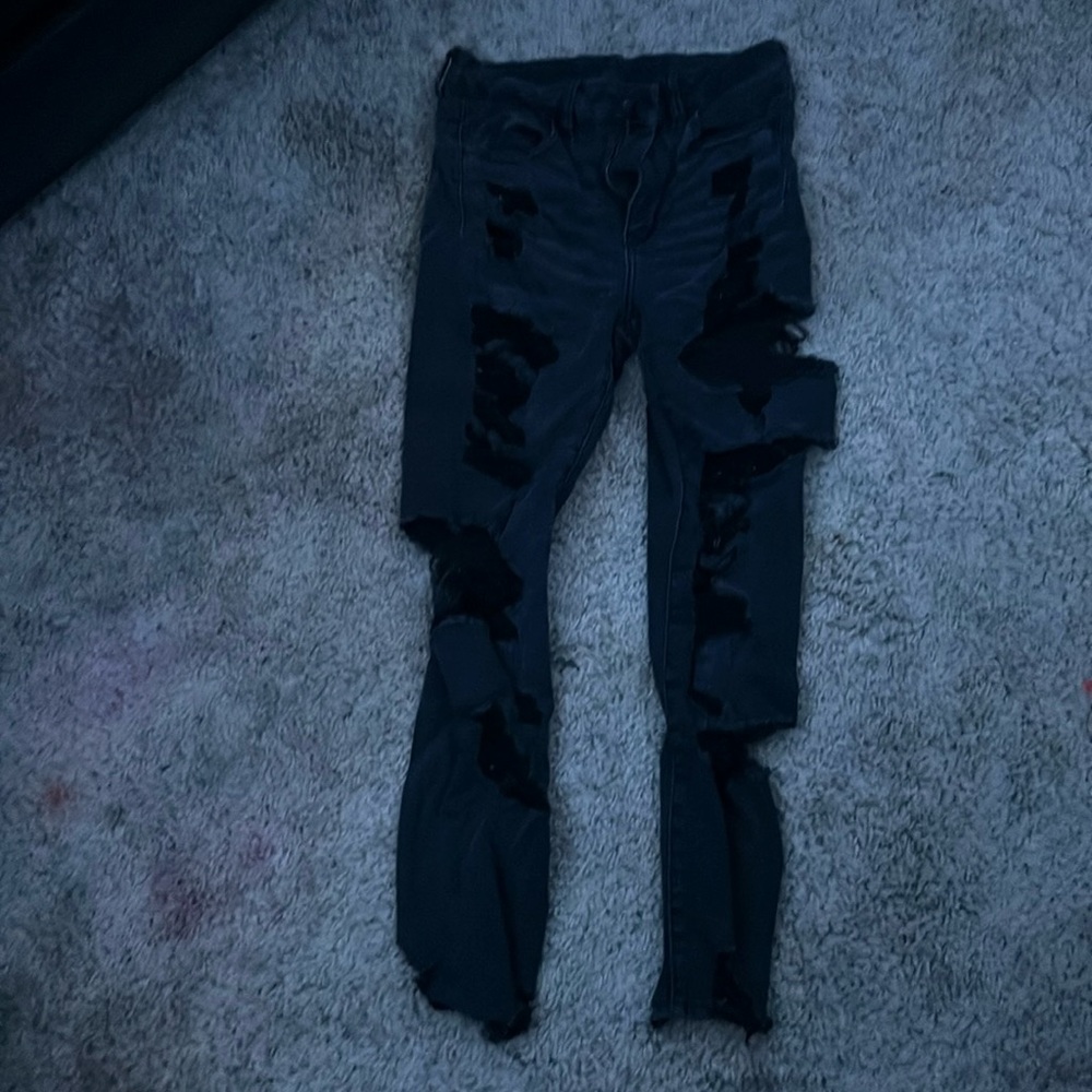 Black American eagle stretchy skinny jeans in size 6